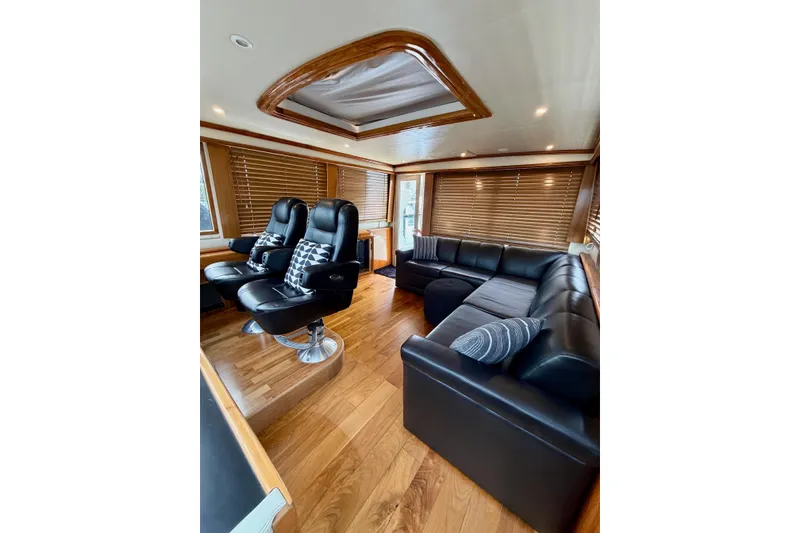 Slide: The Image of Luxurious interior of 2009 Navigator California 50 Veneti yacht with leather seating and wood accents. - 7