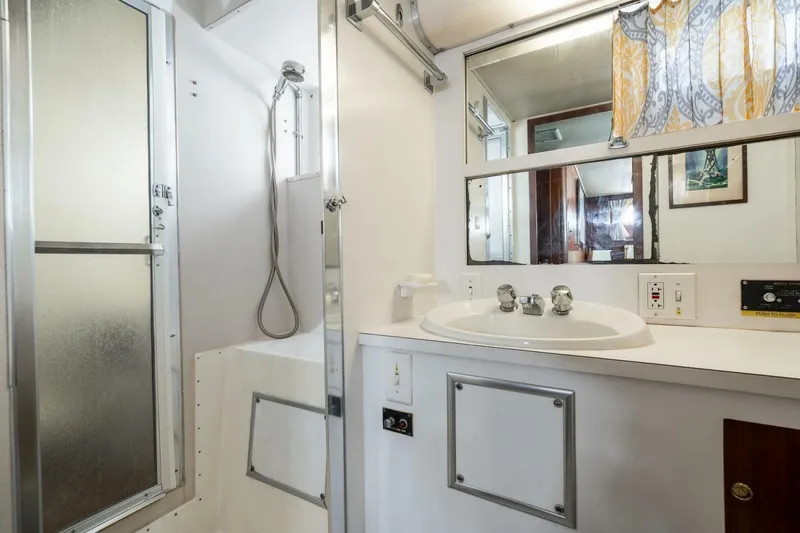 Slide: The Image of Bathroom interior of 1978 Hatteras 53 Yacht Fisherman with shower and sink. - 68