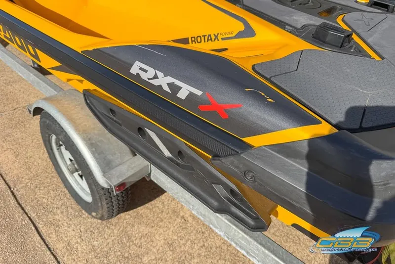 Slide: The Image of 2021 Sea-Doo RXT-X 300 jet ski on trailer, featuring Rotax engine branding. - 9