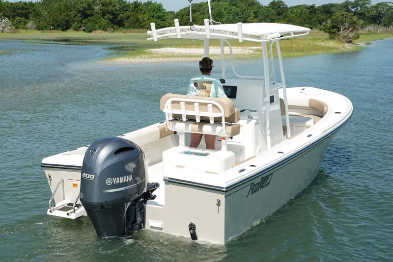 Slide: The Image of 2018 Parker 2300 Special Edition boat interior with seating and console. - 4