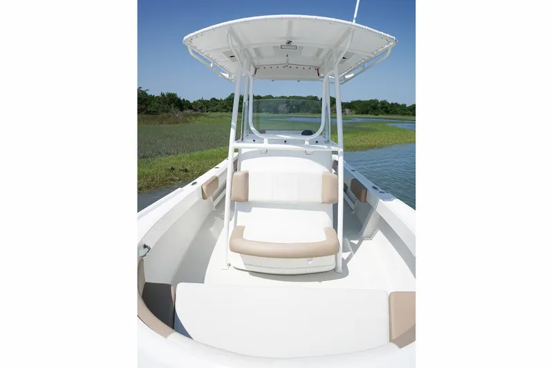Slide: The Image of 2018 Parker 2300 Special Edition boat interior with seating and outboard motor. - 6