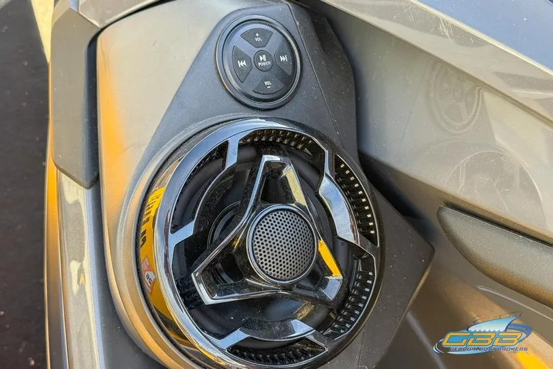 Slide: The Image of Close-up of 2023 Sea-Doo RXT-X 300 speaker and control panel. - 5