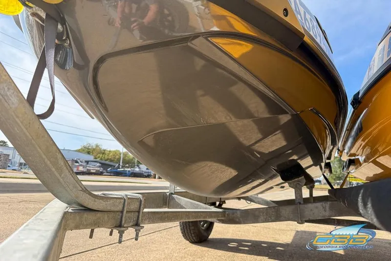 Slide: The Image of 2023 Sea-Doo RXT-X 300 on trailer, close-up view of hull underside. - 6