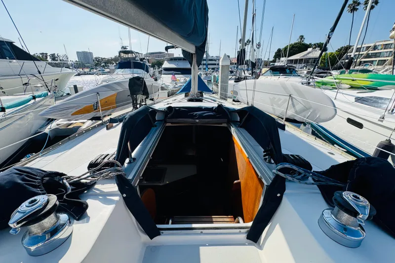 Slide: The Image of 1989 Hunter Legend 37 sailboat docked at marina, view from deck. - 20