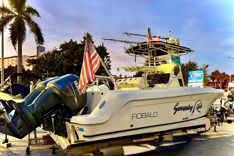 Slide: The Image of 2004 Robalo R260 Center Console boat with logo in focus. - 14