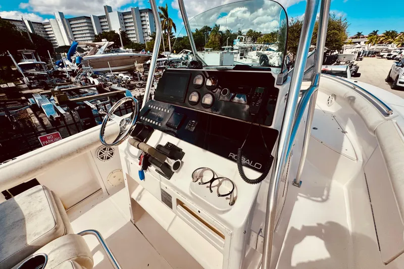 Slide: The Image of Opening storage compartment on 2004 Robalo R260 Center Console boat. - 19