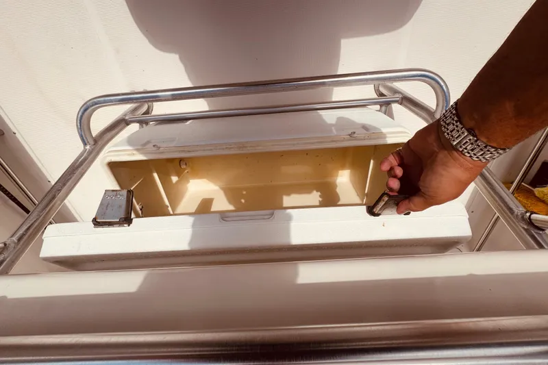 Slide: The Image of 2004 Robalo R260 Center Console with Garmin navigation display at night. - 46