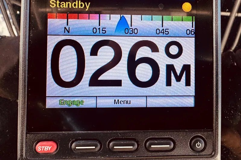 Slide: The Image of 2004 Robalo R260 Center Console dashboard with navigation and control instruments. - 51