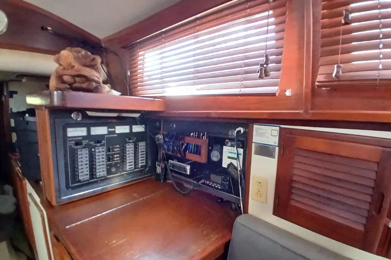 Slide: The Image of Interior of 1986 Irwin 43 sailboat with control panel and wooden blinds. - 20