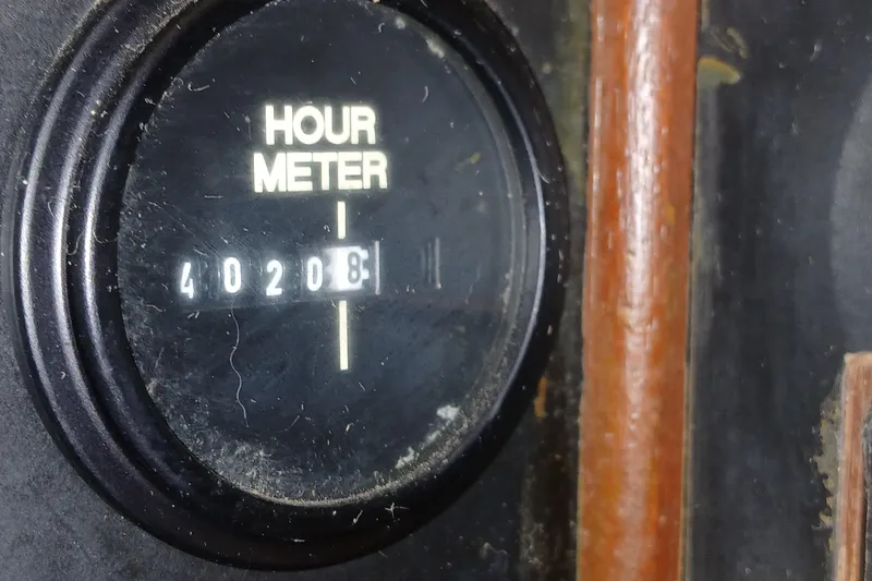 Slide: The Image of Hour meter reading 40208 on 1986 Irwin 43 boat dashboard. - 21