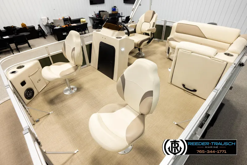 Slide: The Image of 2023 Avalon VEN BF boat interior with beige seating and modern design. - 10