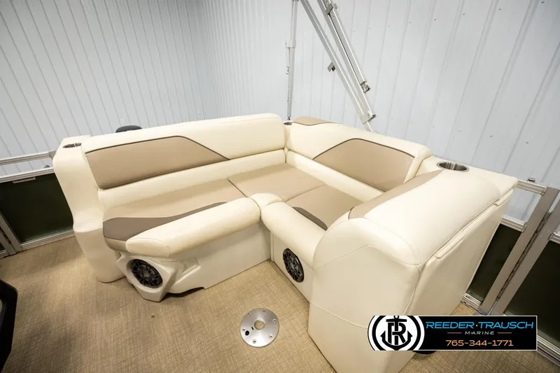 Slide: The Image of Luxurious seating in 2023 Avalon VEN BF boat with beige upholstery and integrated speakers. - 19
