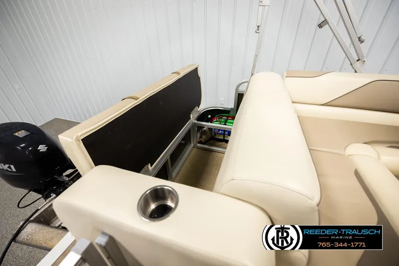 Slide: The Image of 2023 Avalon VEN BF boat interior with Suzuki engine and seating area. - 23