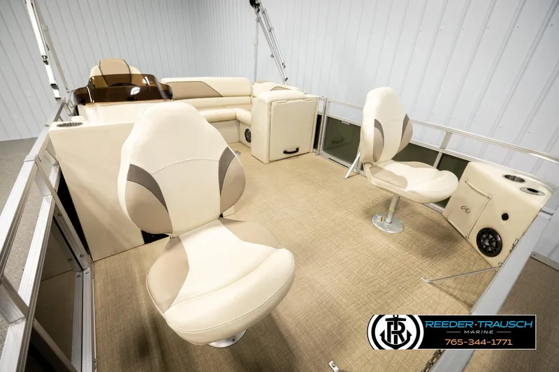 Slide: The Image of 2023 Avalon VEN BF boat interior with beige seating and modern design. - 25
