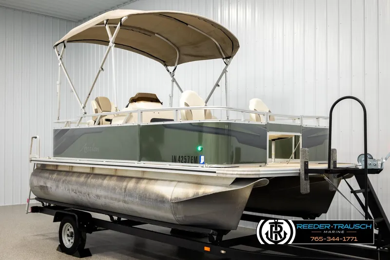 Slide: The Image of 2023 Avalon VEN BF pontoon boat on trailer in indoor showroom. - 3