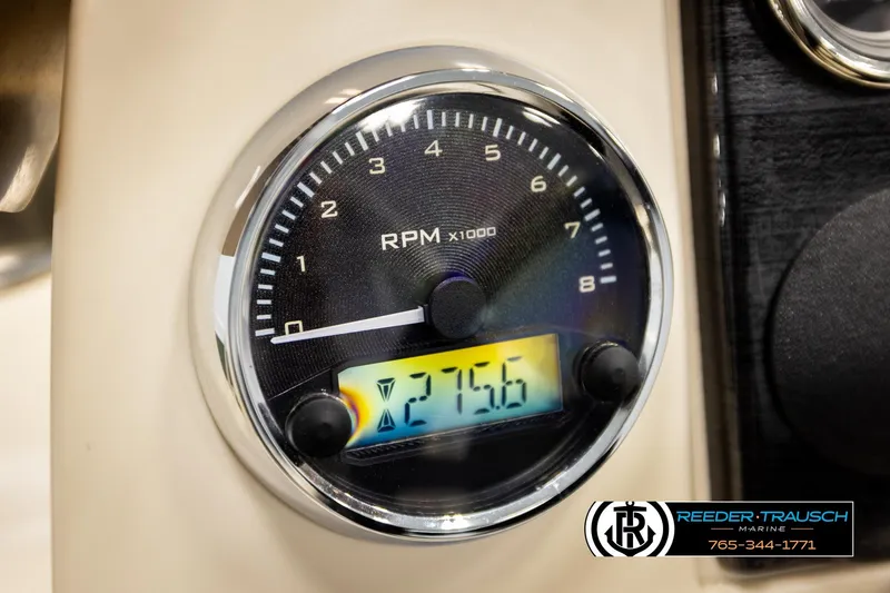 Slide: The Image of Close-up of 2023 Avalon VEN BF tachometer displaying 275.6 RPM, Reeder-Trausch Marine branding. - 31