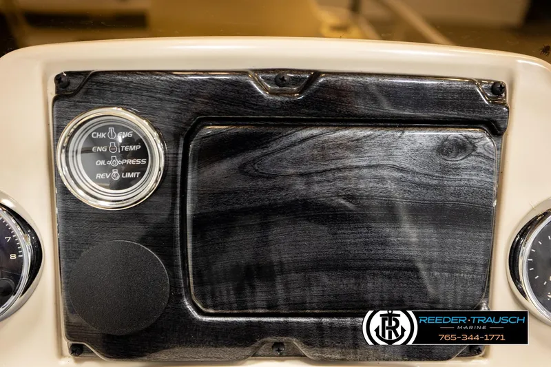 Slide: The Image of Dashboard of 2023 Avalon VEN BF boat with gauges and controls. - 32