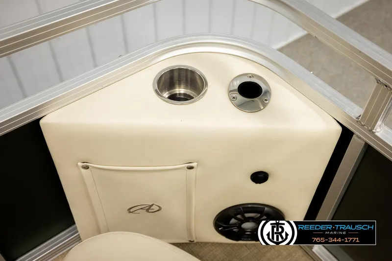 Slide: The Image of Interior of 2023 Avalon VEN BF boat with cup holder and speaker detail. - 40