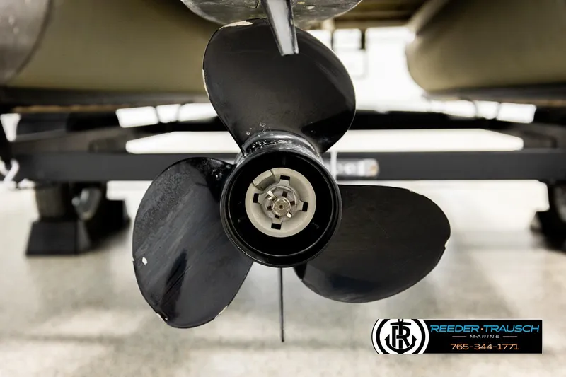 Slide: The Image of Close-up of a 2023 Avalon VEN BF boat propeller in a showroom setting. - 47