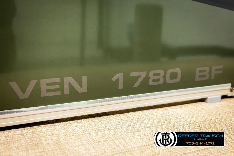 Slide: The Image of 2023 Avalon VEN BF boat with "VEN 1780 BF" marking, Reeder-Trausch Marine logo visible. - 49