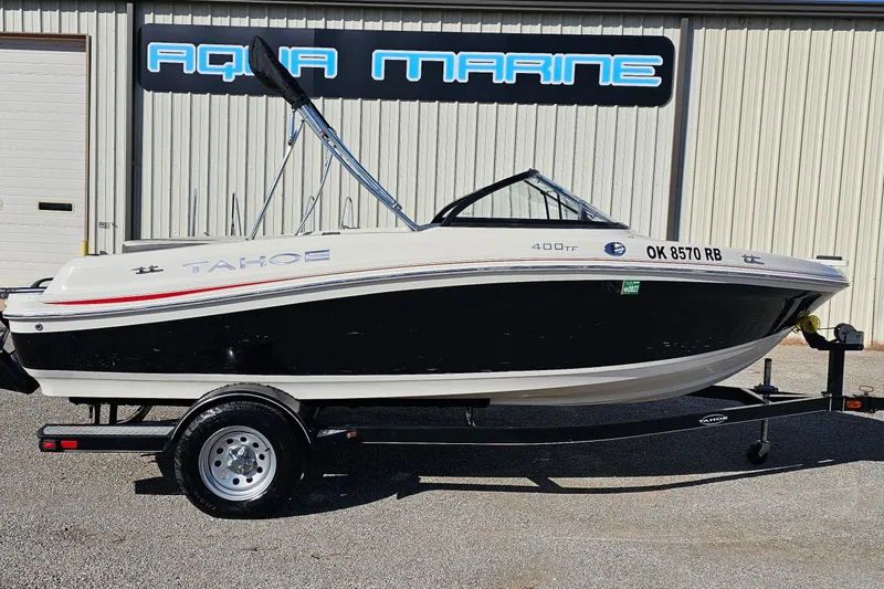 The Image of 2016 Tahoe 400 TF boat on trailer outside Aqua Marine building. - 0