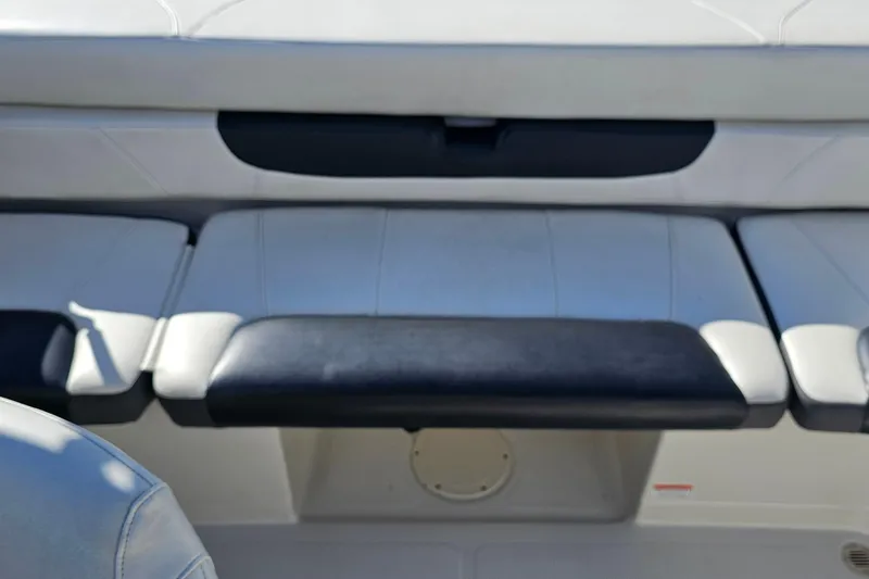 Slide: The Image of 2016 Tahoe 400 TF boat seating area with white and black upholstery. - 16