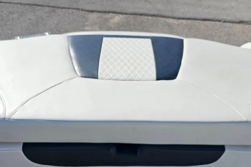 Slide: The Image of 2016 Tahoe 400 TF boat seat with white and black upholstery. - 17