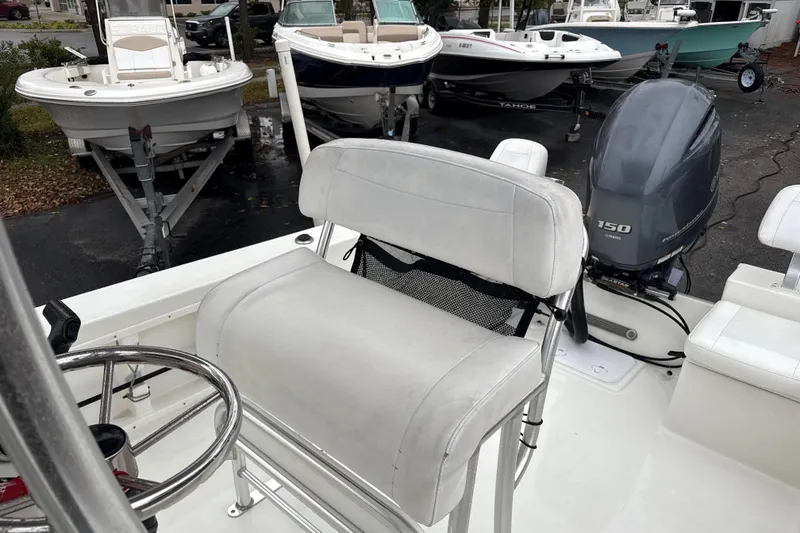 Slide: The Image of 2017 Bay Rider 2260 FS Skiff with Yamaha 150 outboard motor, parked on a trailer. - 4