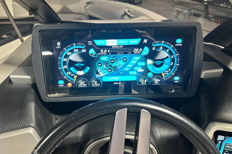 Slide: The Image of Dashboard of a 2016 Malibu Wakesetter 23 LSV boat with digital display. - 13