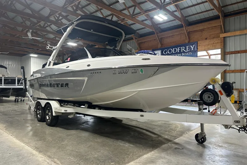 Slide: The Image of 2016 Malibu Wakesetter 23 LSV boat on trailer in indoor storage facility. - 3