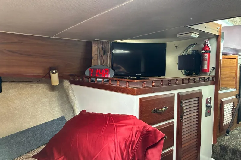 Slide: The Image of Tollycraft 30 Sedan - Owner's Cabin Storage - 7