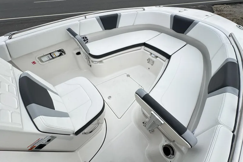 Slide: The Image of 2026 Robalo R250 Center Console boat interior with sleek seating and modern design. - 11