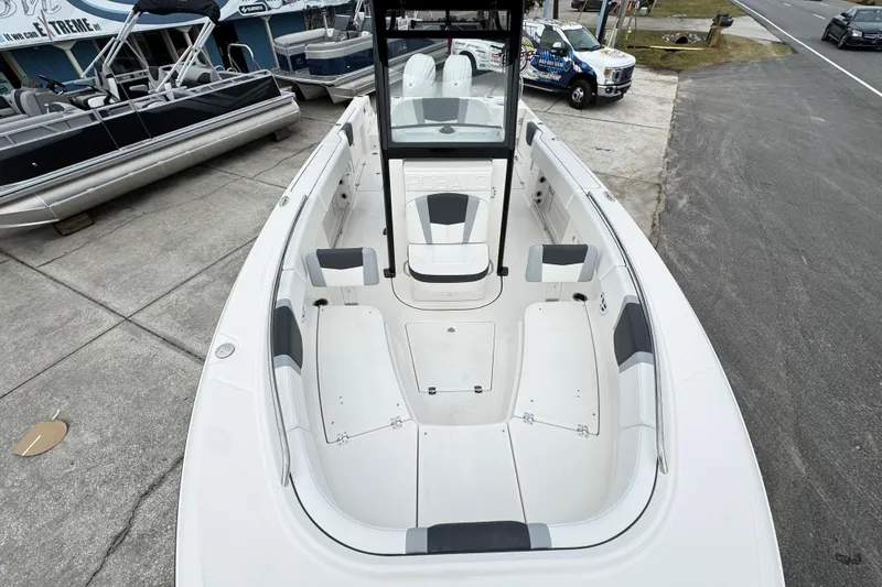 Slide: The Image of 2026 Robalo R250 Center Console boat with spacious seating and sleek design. - 19