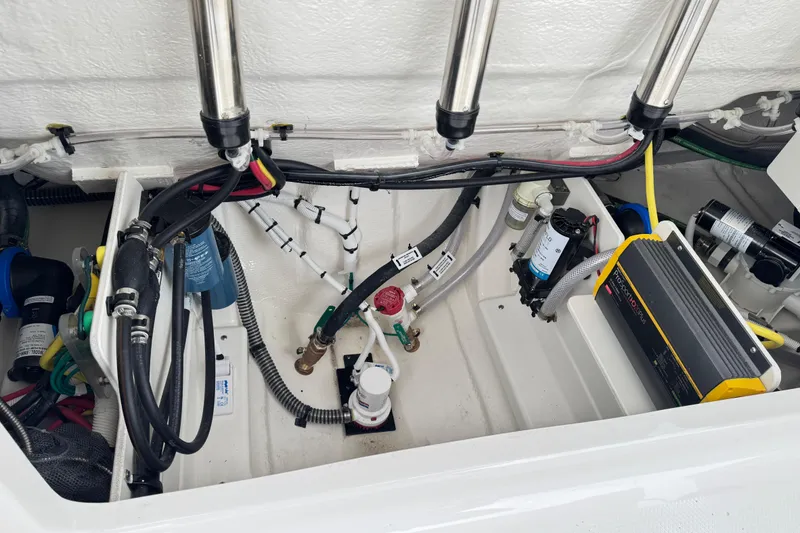 Slide: The Image of 2026 Robalo R250 Center Console boat interior wiring and components. - 25