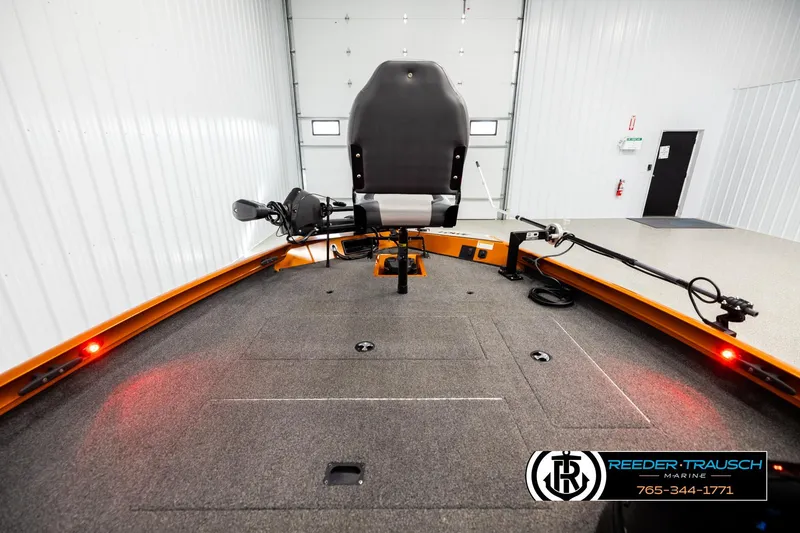 Slide: The Image of 2022 Lowe Stinger 178 boat interior with fishing seat and trolling motor. - 14