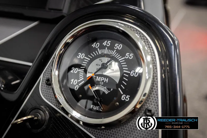 Slide: The Image of Close-up of 2022 Lowe Stinger 178 speedometer and fuel gauge. - 31