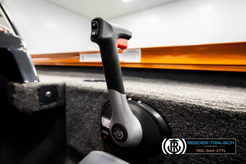 Slide: The Image of Close-up of throttle control in 2022 Lowe Stinger 178 boat, featuring ergonomic design. - 35