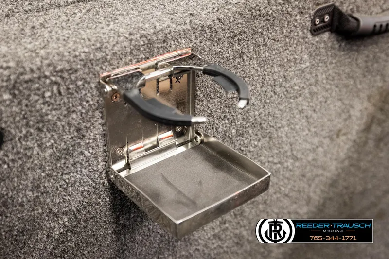 Slide: The Image of Foldable cup holder on 2022 Lowe Stinger 178 boat, gray carpeted interior. - 37