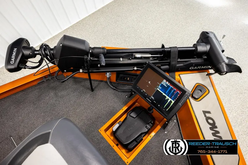 Slide: The Image of 2022 Lowe Stinger 178 boat with Garmin fishfinder and trolling motor setup. - 39
