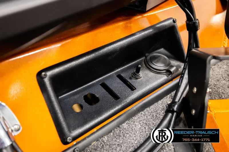 Slide: The Image of Control panel of 2022 Lowe Stinger 178 boat with switch and socket. - 42