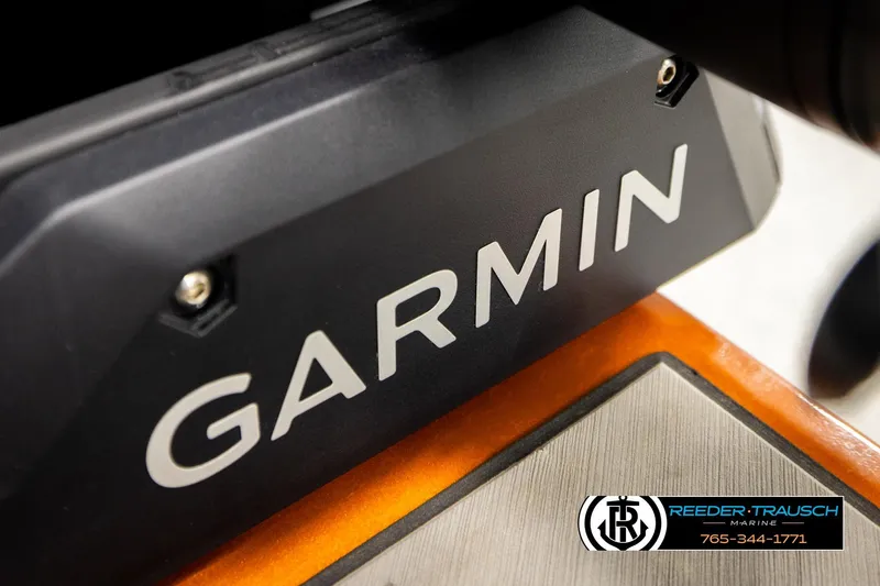 Slide: The Image of Close-up of Garmin device on 2022 Lowe Stinger 178 boat dashboard. - 43