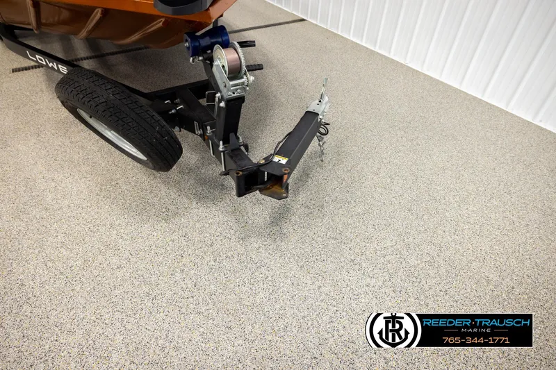 Slide: The Image of Trailer hitch of 2022 Lowe Stinger 178 boat on showroom floor. - 54