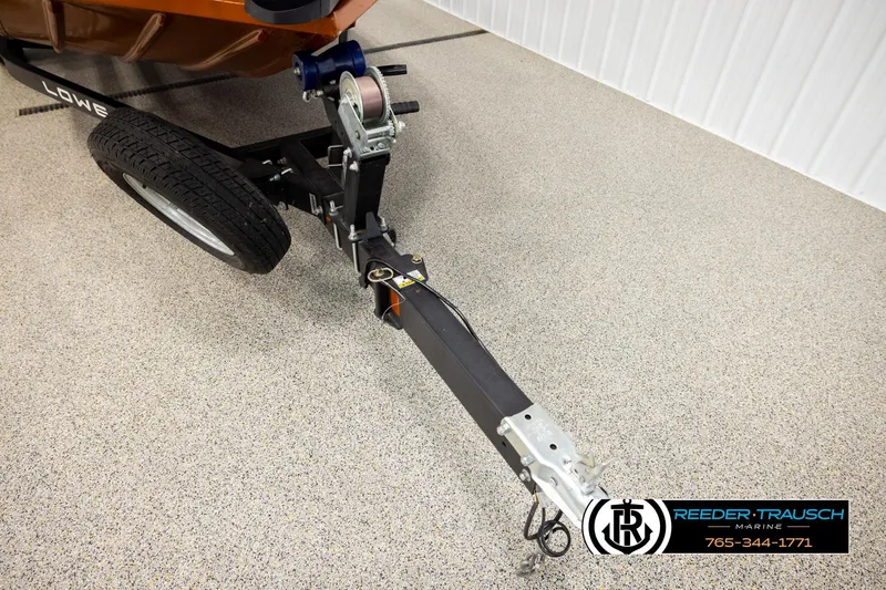 Slide: The Image of Trailer hitch of 2022 Lowe Stinger 178 boat on showroom floor. - 55