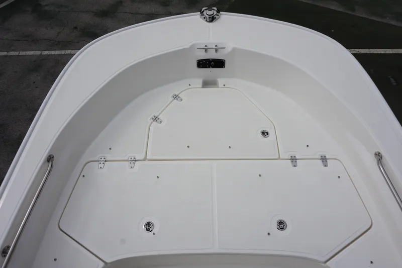 Slide: The Image of 2026 Boston Whaler 190 Montauk boat deck with storage compartments. - 15