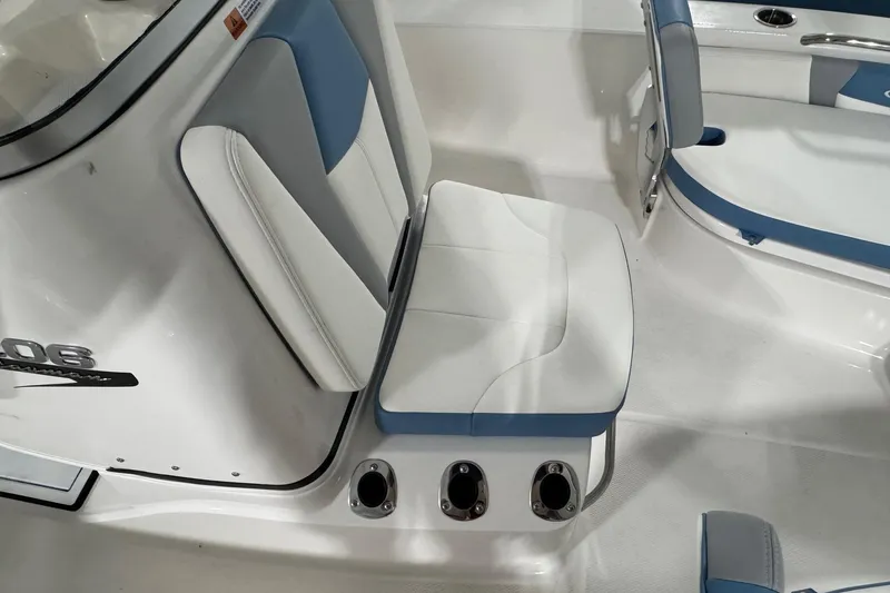 Slide: The Image of 2026 Robalo 206 Cayman boat interior with white and blue seating. - 17
