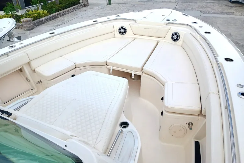 Slide: The Image of 2025 Grady-White Canyon 386 boat interior with luxurious seating and modern design. - 8