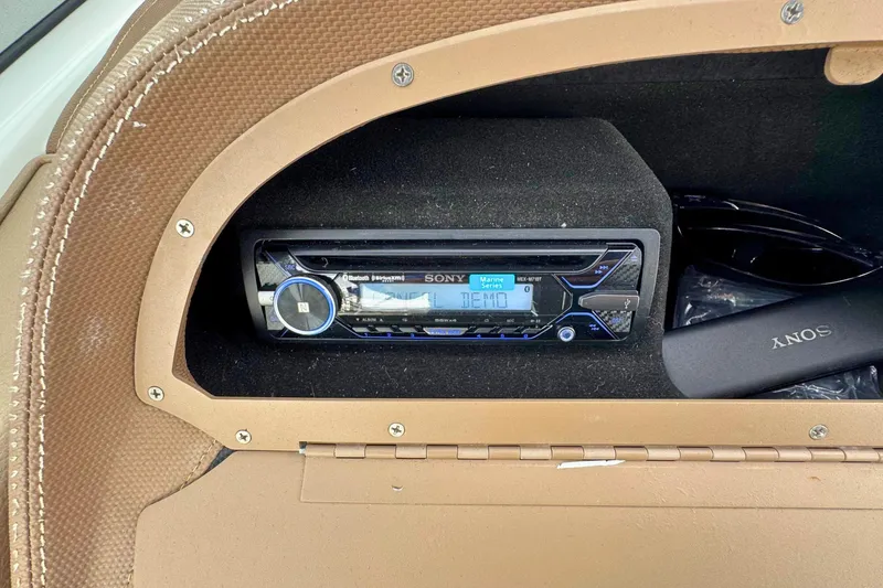 Slide: The Image of Sony marine stereo in a 2010 Cobalt 242 boat dashboard compartment. - 19