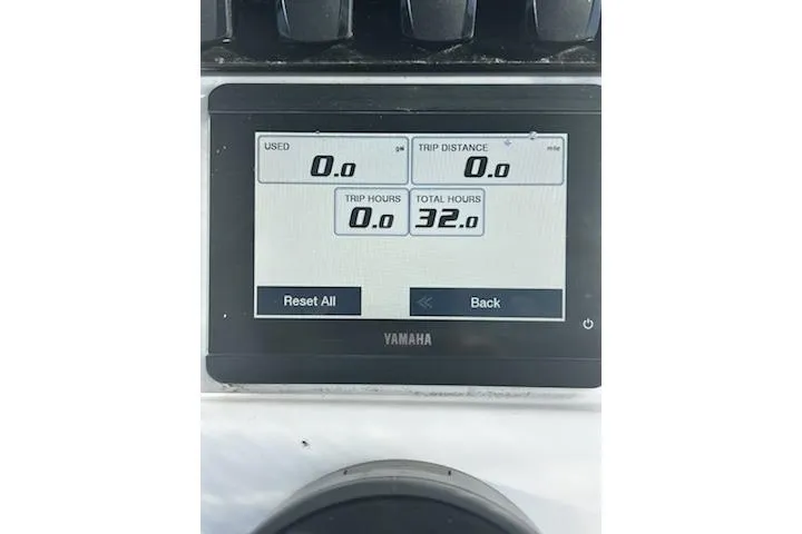 Slide: The Image of 2023 Sea Hunt Ultra 239 SE boat with brown cushioned seating on deck. - 11