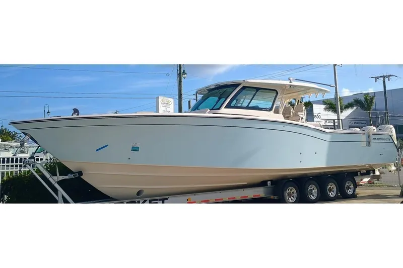 The Image of 2025 Grady-White Canyon 456 boat on trailer, side view, outdoors. - 1