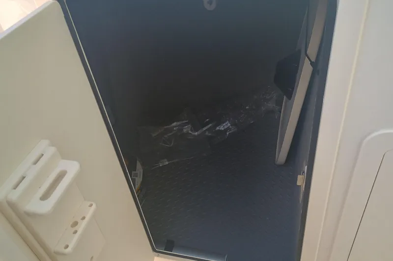 Slide: The Image of Interior storage compartment of 2025 Grady-White Canyon 456 boat. - 10